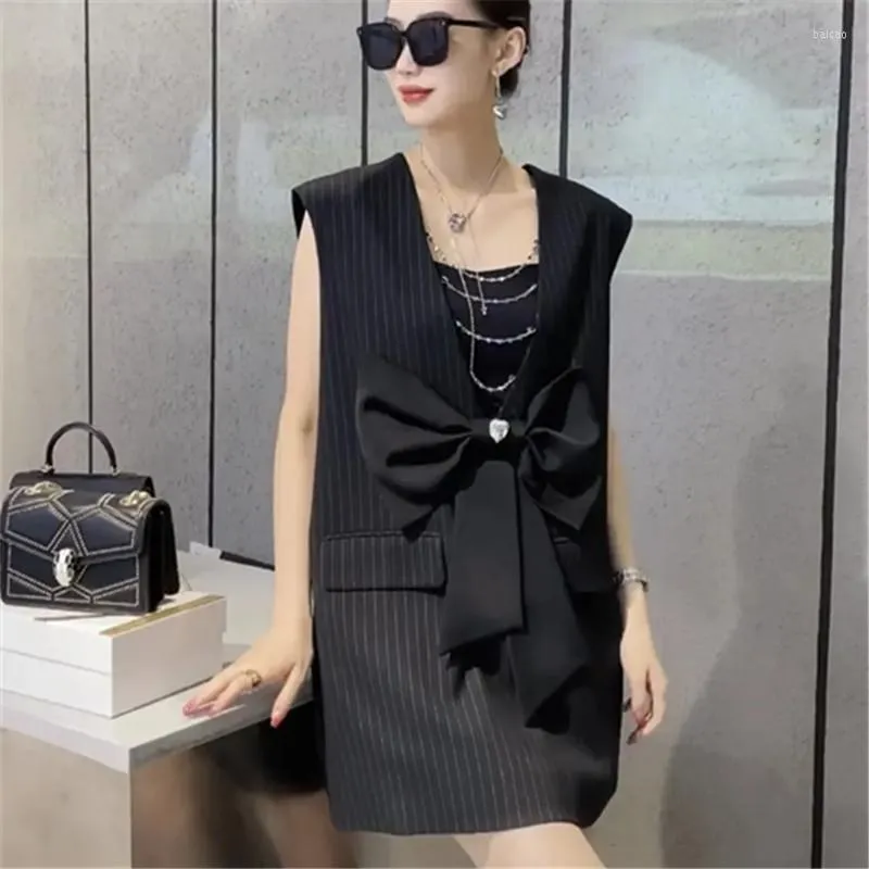 Coletes femininos Big Bow Fashion Design Sense Vest Skirt Mid-Length Spring Spring Spring Suit Collares Backless Backless listrado Coloque preto