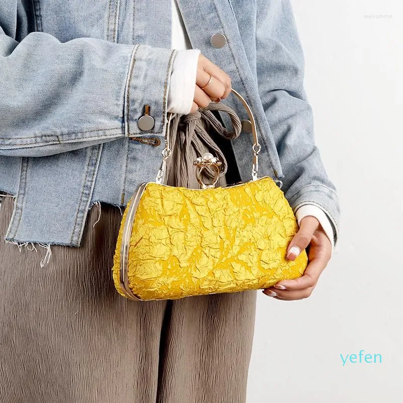 Designer yellow purse sales