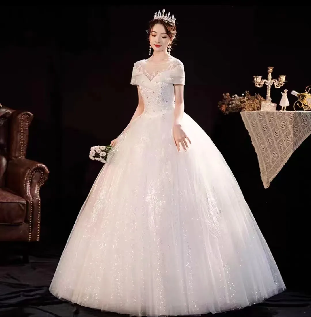 2024 elegante super lindo decote redondo de qualidade e decote de qualidade com contas artesanais vestido de bola de casamento com luxo de renda e mangas compridas vestido de noiva