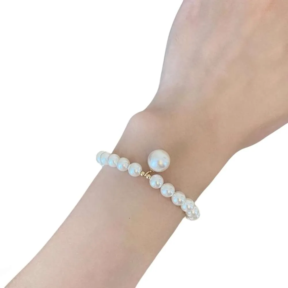 Swarovskiso Armband Designer Kvinnor Toppkvalitet Nytt 6mm Pearl Armband Enkelt och elegant armband unikt design och kedjesmycken