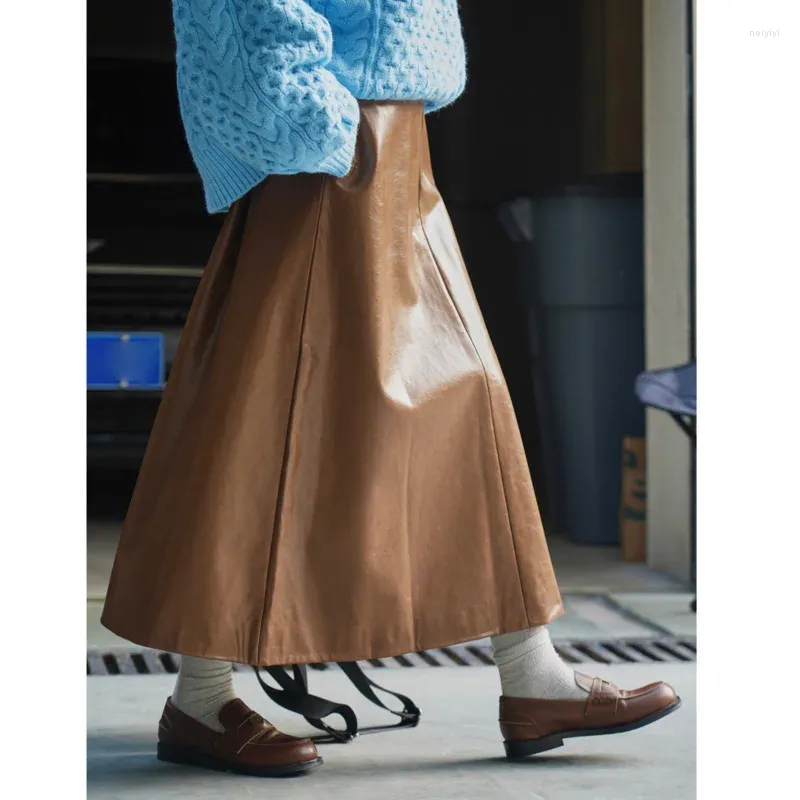 Spódnice brązowe linia skórzana spódnica midi zimowa koreańska duża huśtawka wysoka talia