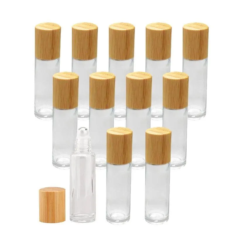 Botellas de rodillos de vidrio transparente esmerilado de 5 ml y 10 ml con viales de aceite esencial con bolas de rodillos de metal con tapa de bambú Bcmlb