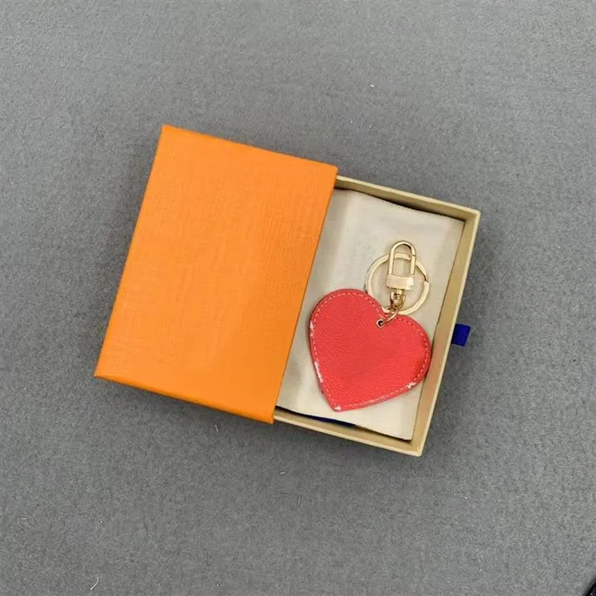 Chain de fivela -chave do coração amantes de fivela saco encantos de designers de couro feitos à mão Chaves homens Mulheres bolsas de bolsa acessórios com box209p