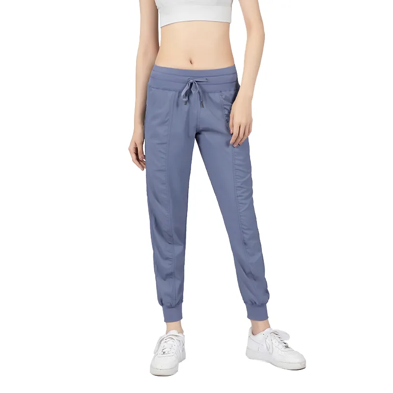 Pantaloni da jogger ad alto palestra sport rilassato da donna sciolta di donne asciutte sport per palestra pantaloni della tuta femme yoga da esterno