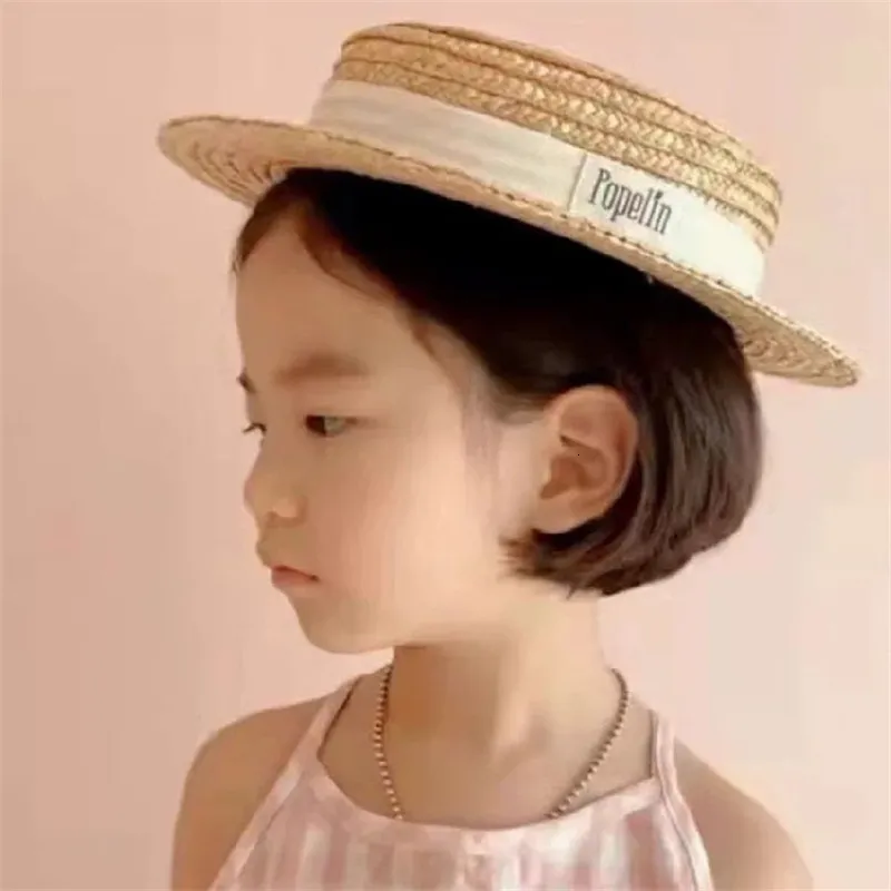 Czapki kapelusze przybysze mody dzieci chłopiec dziewczyna sunhats płaska czapka na zewnątrz na plaży świąteczne Sunprotection Summer Słomka dla dzieci 230427