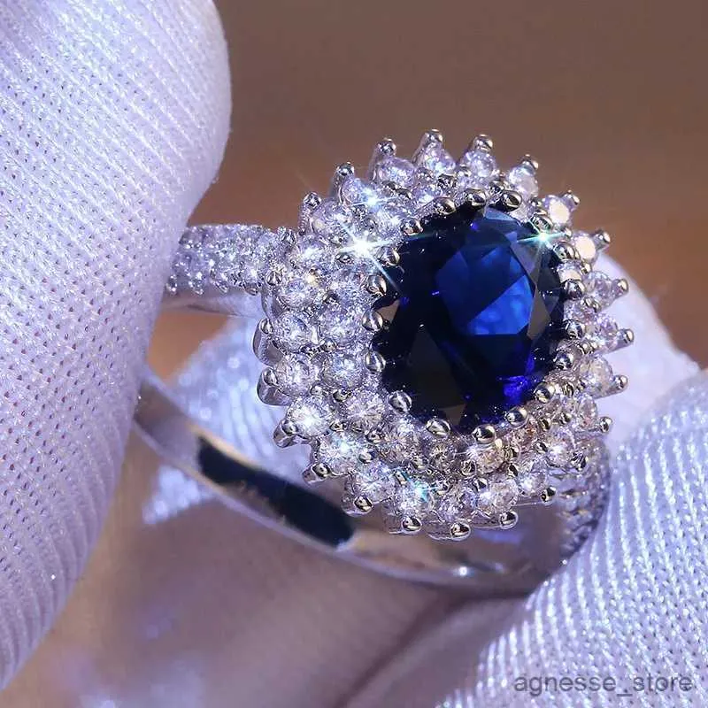 Fedi nuziali Anelli di pietra di cristallo blu di lusso con piccoli fiori Cubic Zirconia Gioielli da donna eleganti Accessori di fidanzamento eleganti R231127