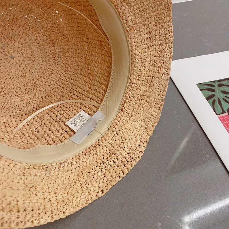 품질 넓은 브림 밀짚 모자 디자이너 버킷 모자 여성 패션 손으로 직조 캡 남성 여름 모자 해변 모자 카스 퀘트 선 버킷 모자