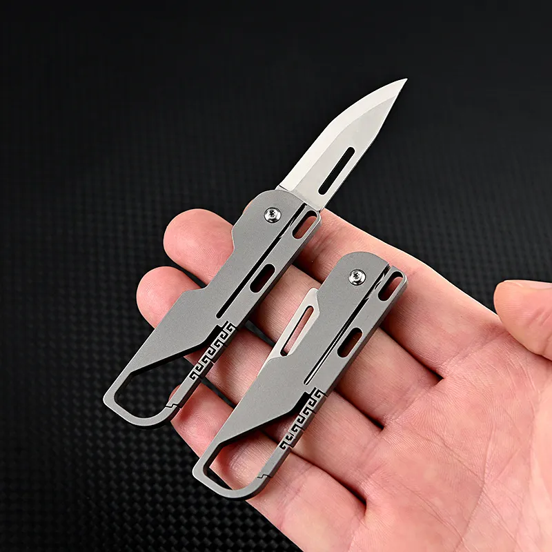 Titanium legering mini vouwmes hoge hardheid d2 mes sleutelhanger hanger pocket paring mes outdoor eDC gereedschap