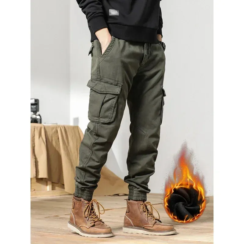 Męskie spodnie Multipockets Zimowe Ładunki Mężczyzny Polar Liner Gruby ciepłe, szczupłe joggery uliczne odzieżowe bawełniane spodnie termiczne 231127