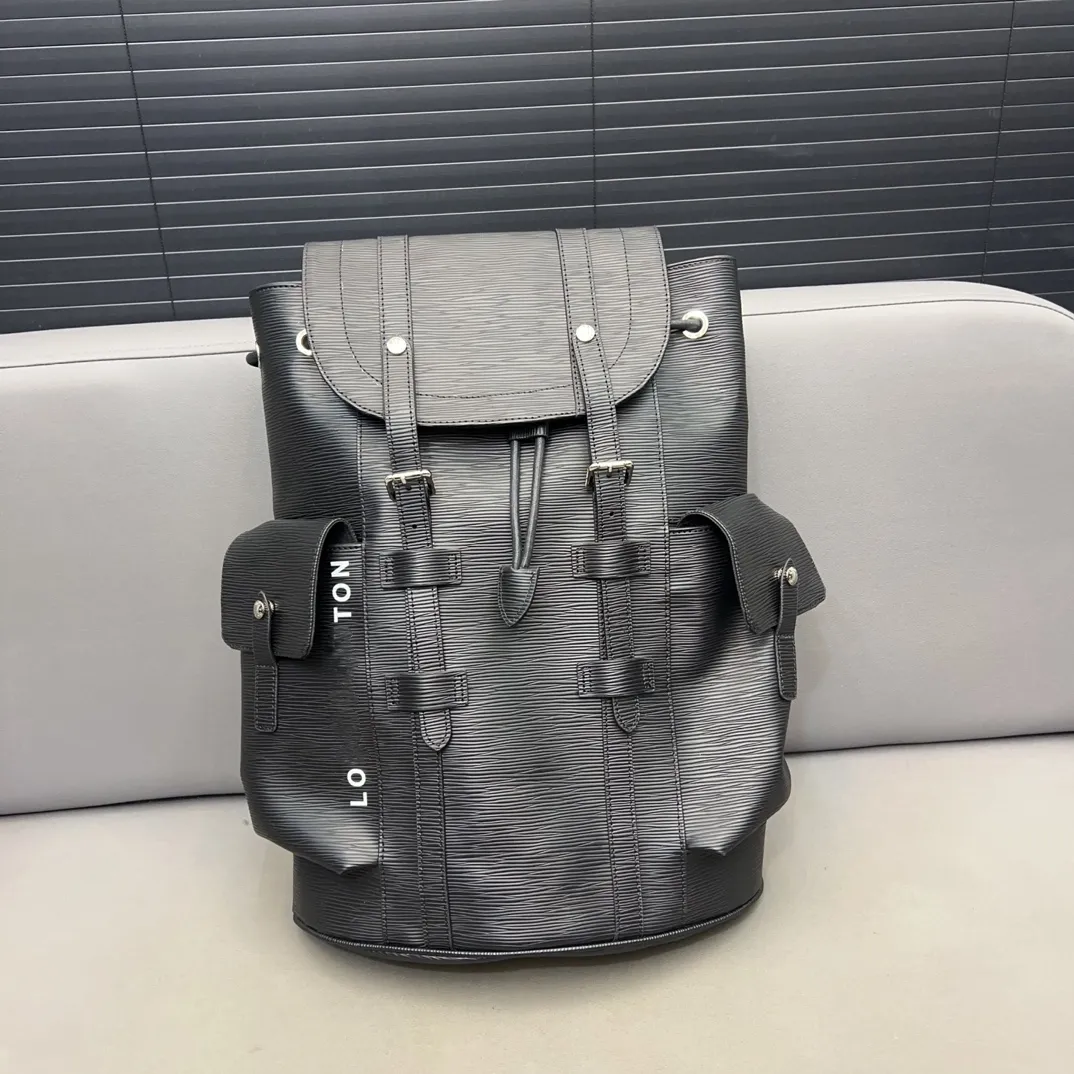 Bolsos de diseñador Mochila para hombre CHRISTOPHER Mochila con ondas de agua Carta Unisex Totes de gran capacidad Bolsos de moda Bolsa de viaje Mochilas escolares Bolsos casuales para mujer al aire libre Totes