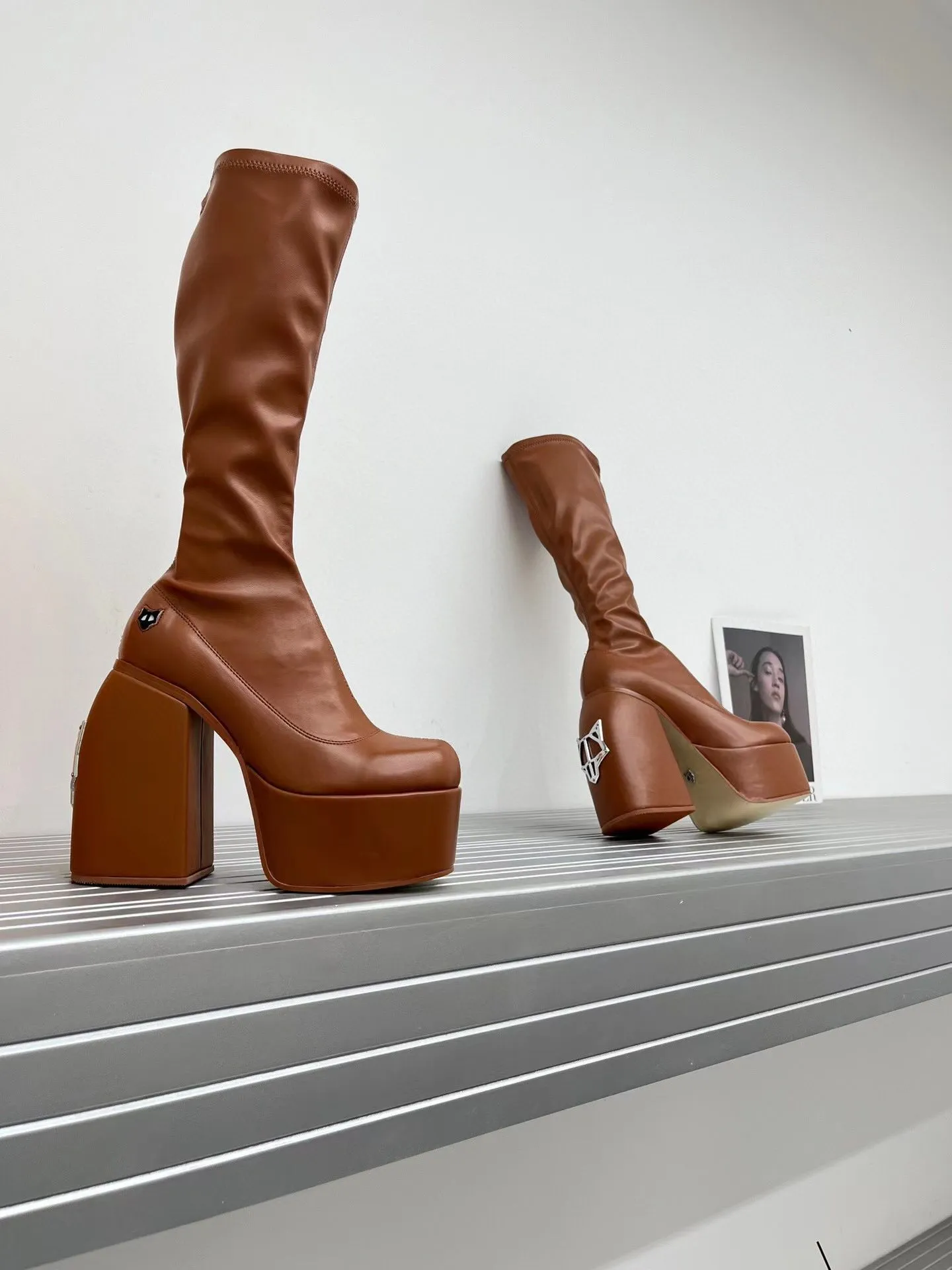 DHgate.com:Naked Wolfe Spice Knee-high Black Leather Chunky