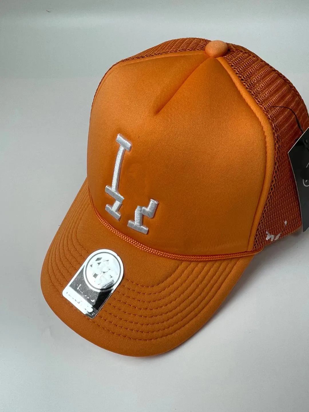 Top Creux et respirant Casquette de designer en plein air Mode Menshat Femmes Baseball Chapeaux ajustés Lettre orange Été Parasol Sport Broderie Plage Toile Ball Caps