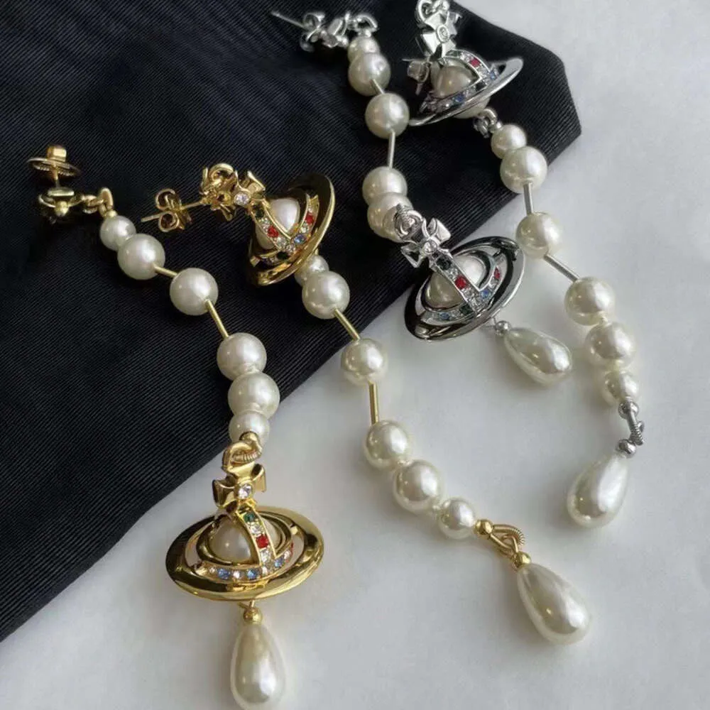 Créateur Viviene Westwoods Nouvelle Viviennewestwood Western Empress Dowager Asymétrique Perle Solide Saturne Boucles D'oreilles Pendentif Planète Française Courte et Longue Gland Earri