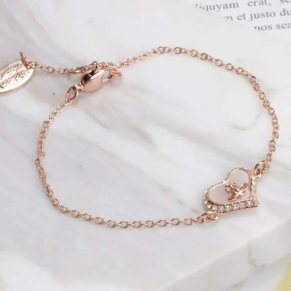 Designer vivienen Westwoods New Viviane Empress Dowager Love Saturn Beimu Bracelet Ins Small Fragrant Wind Shell Peach Heart Handicraft High Version