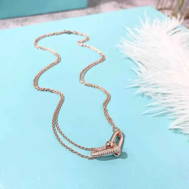 Tiffany and co double ring deals necklace