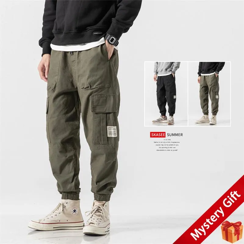 Calças masculinas carta gráfico utilitário bolso cordão cintura joggers calça elástica militar outono casual ajuste calças de carga tática