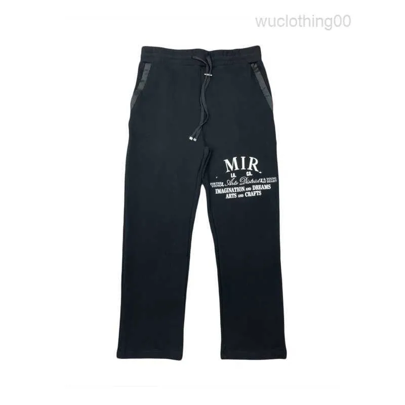 Sweatpants män svarta svettbyxor blixtlås fickor knappar fluga raka ben tröjor män tröjor med fickor män byxor brev dekoration tjocka byxor