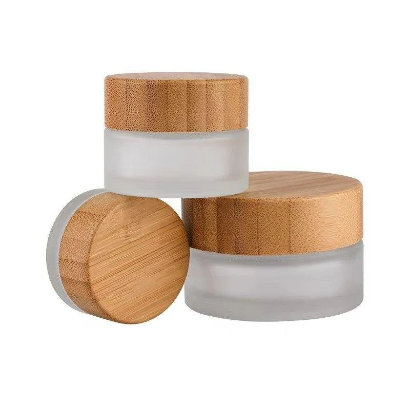 5g 15g 30g 50g 100g Tarro de vidrio cosmético Botellas de crema claras esmeriladas Envase cosmético de viaje con tapas de bambú natural Xkavd