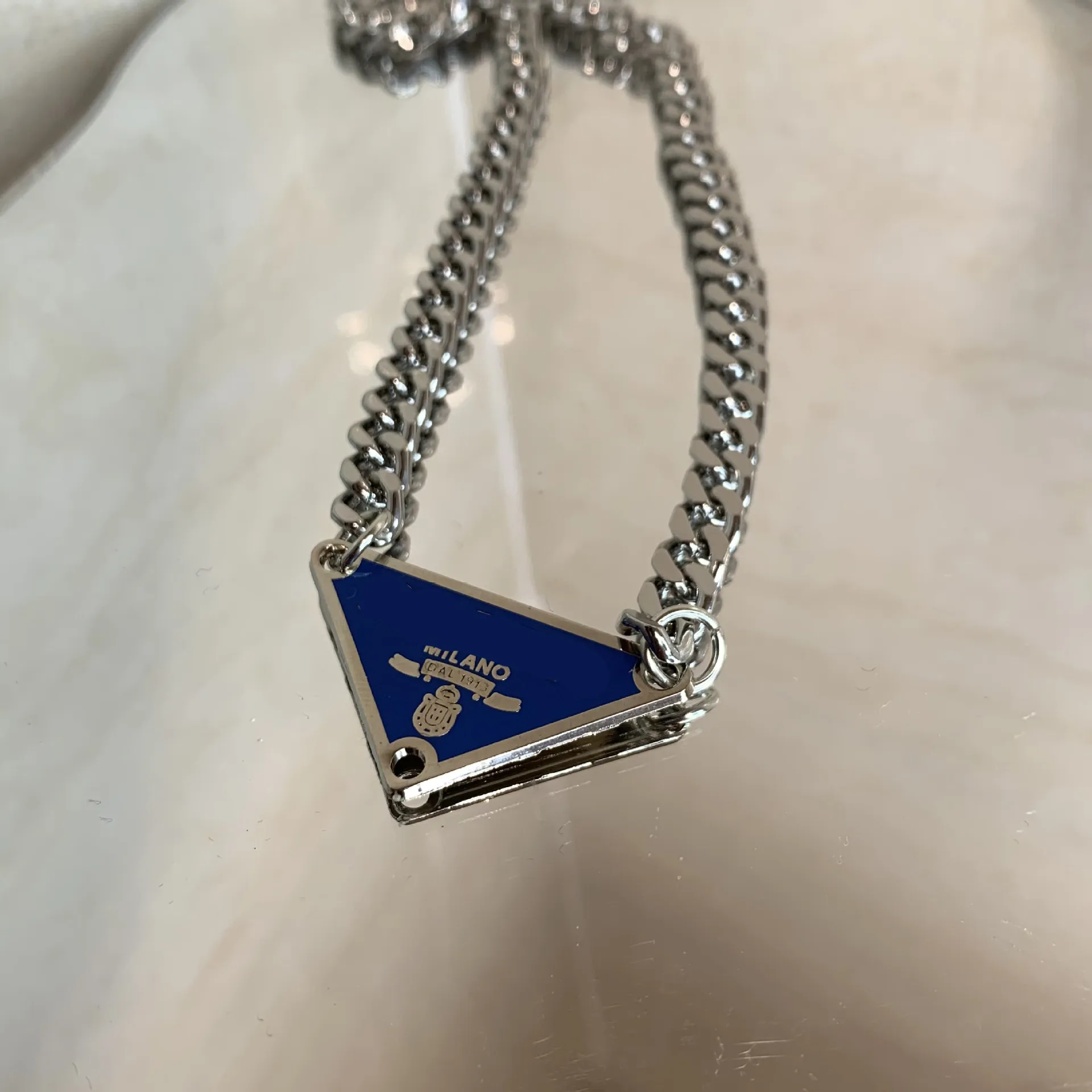 Prada necklace sale dhgate