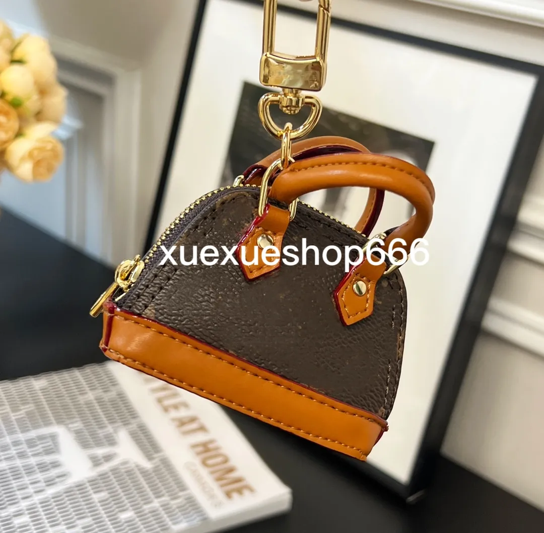 Klassisk unisex nyckelplånbok Purses Luxury Ladies Mini Shell Bags With KeyChain Coin Purs Designer Brand Women and Men Clutch Bags Keyring Bags Charms Pendant Gift