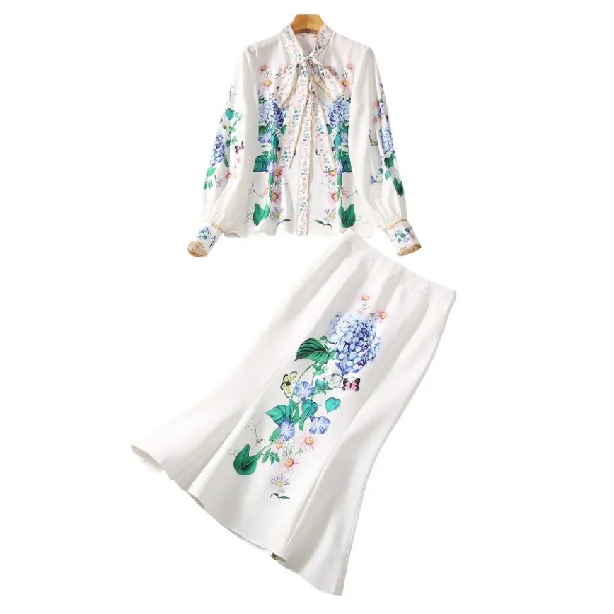 Conjuntos de vestido de dos piezas con lazo y estampado floral blanco de otoño Blusa de un solo pecho con cuello redondo de manga larga + Conjunto de falda de sirena a media pantorrilla Trajes de dos piezas S3O261026