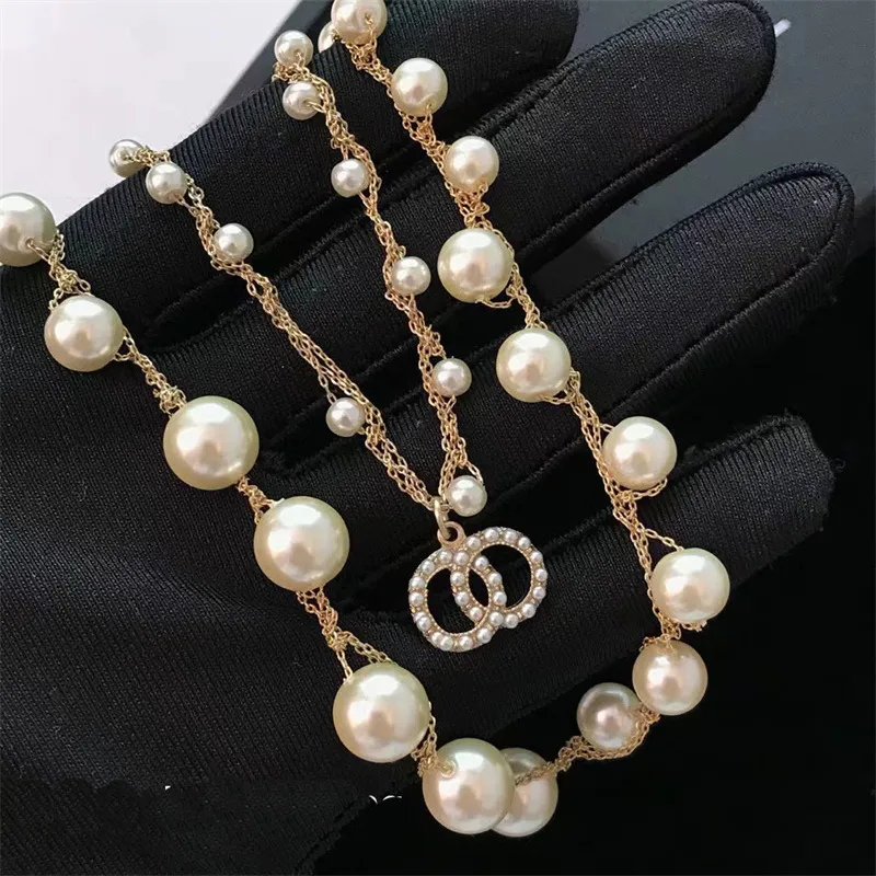 Womens Necklaces Luxury Brand Designer Jewelry Women Pearls Necklace Heart Chain C Gold Chains Letter Jewelrys For Lady Party Accessories