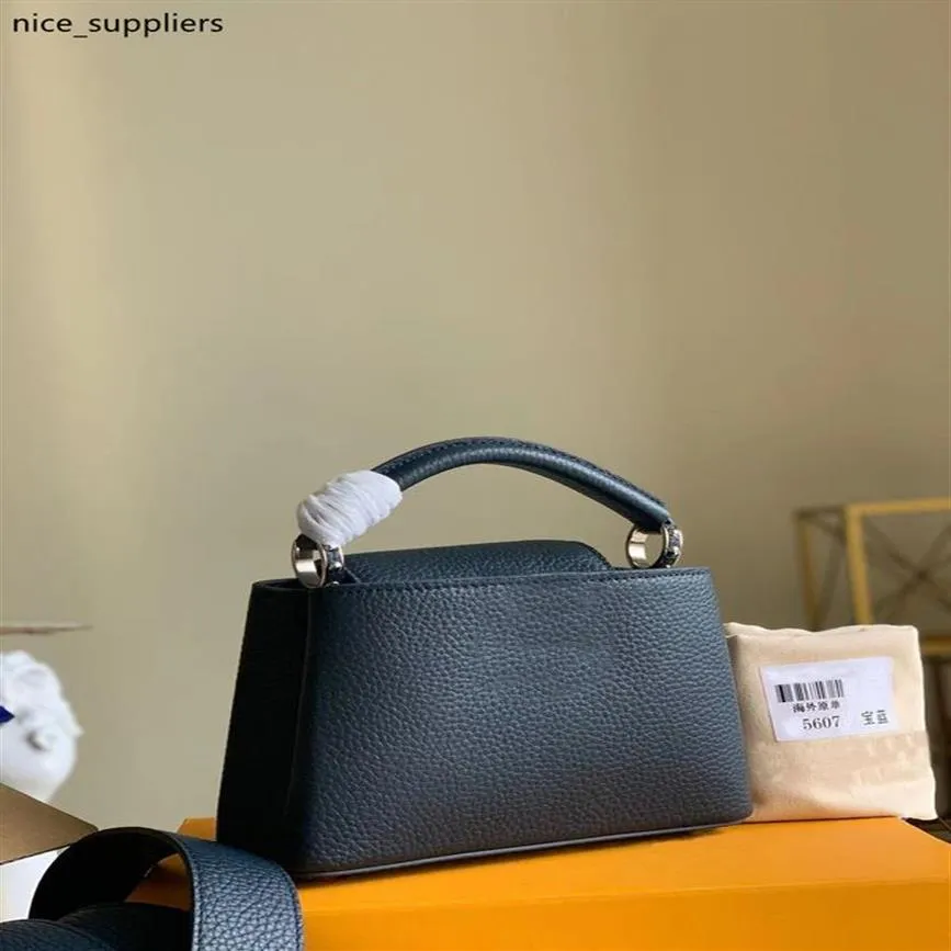 M56770 CAPUCINES MINI handbag Taurillon leather in Atlantic Dark Blue color classic women totes carried by hand or over the should203s
