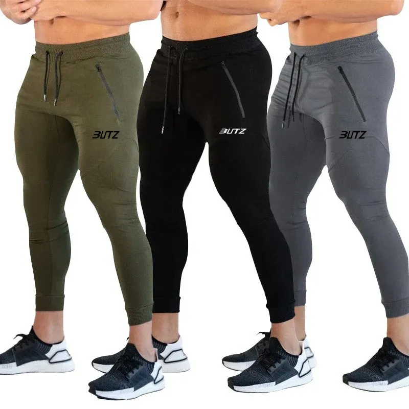 Pantaloni da uomo Fitness Pantaloni elastici Autunno Harun Piedi piccoli Stile sottile Bocca sottile raggruppata Nove punti Pantaloni fitness sportivi 231129