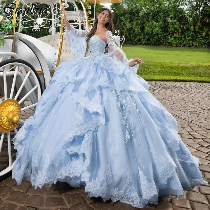 sachin and babi light blue dress Quince Theme Inspiration — Quinceaneras and Bridals Boutique main image 0