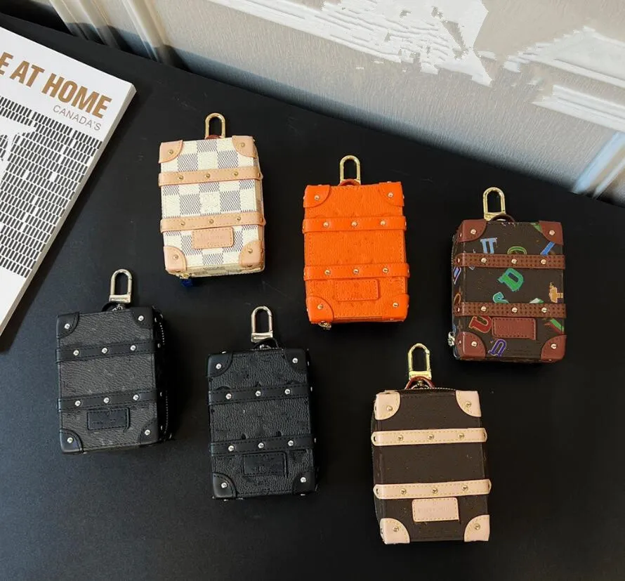 Begränsad upplaga unisex nyckel plånbok designer bokstav pläd mini box väska solros plånböcker Kvinnor Mens Purses Keyring Female Väskor Totes Pendant Charms Keychain
