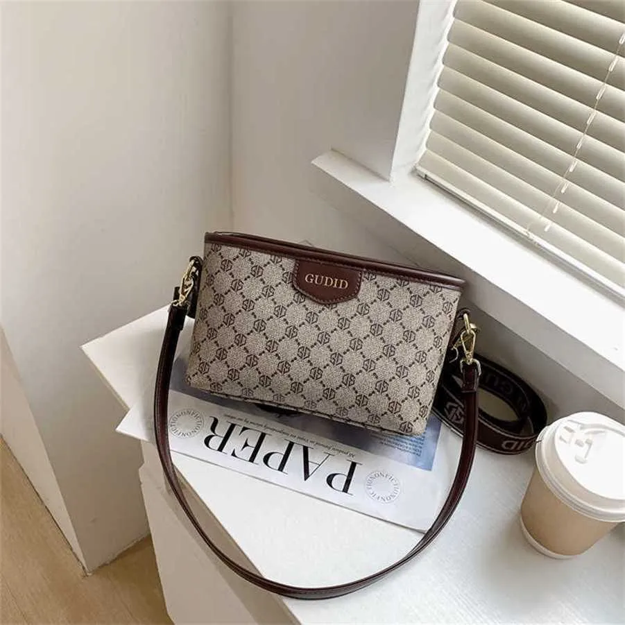 Cüzdanlar Yeni çok yönlü crossbody mizaç kadınlarının küçük vücut moda baskısı omuz çantası temizleme satışı