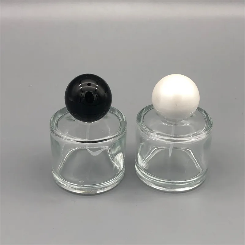 Bouteille de parfum en verre cylindrique de 50ML, flacon de parfum de haute qualité, flacons de pulvérisation cosmétiques à bouchon rond