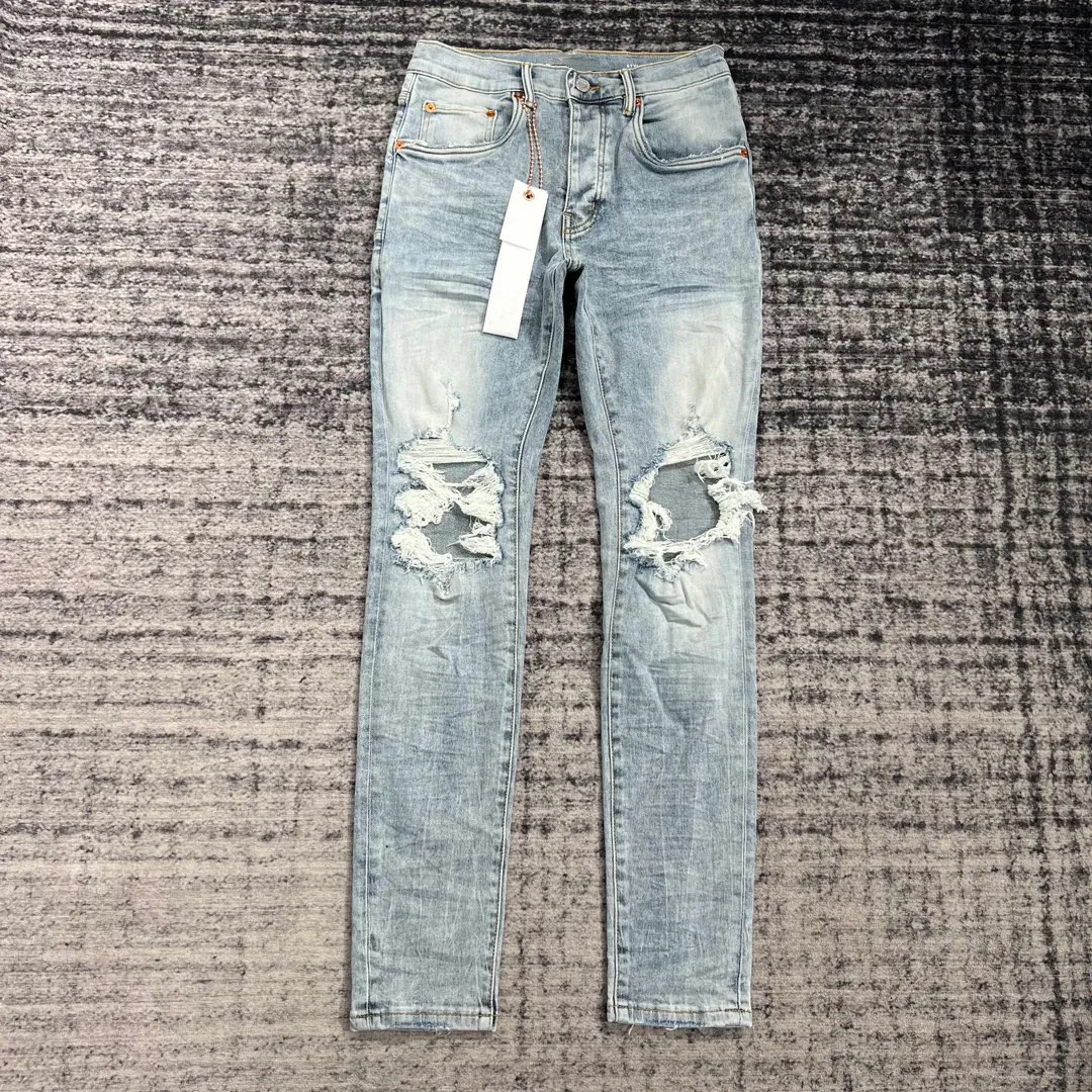 Мужские джинсы мужские узкие эластичные с рваными краями синие 231130