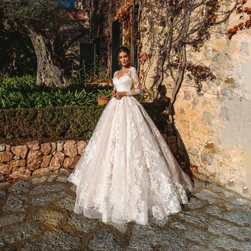 Abiti da sposa a-line con scollo a cuore 2023 Sposa manica lunga da favola Applique Bottoni ricoperti di tulle Hollow Modern Custom Made