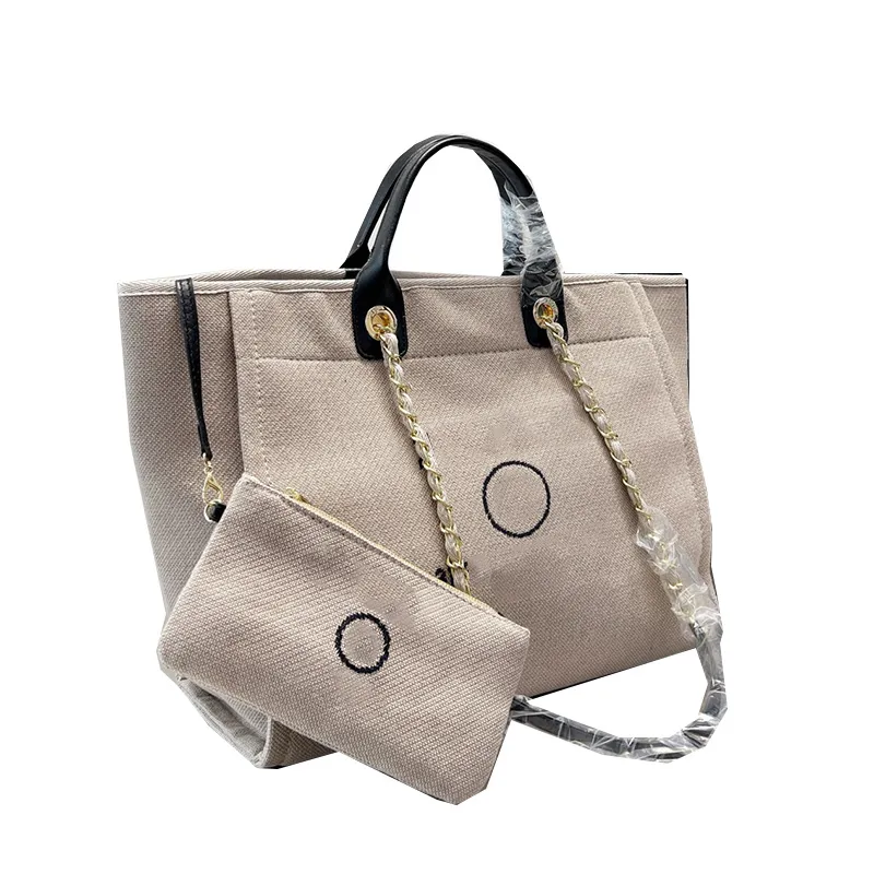 Colección France Womens Canvas Beach Shoppong Bolsos Coin Poche SHW Deauville Cadena Bolsos de hombro Asa superior Totes Gran capacidad Equipaje de viaje 37X30CM