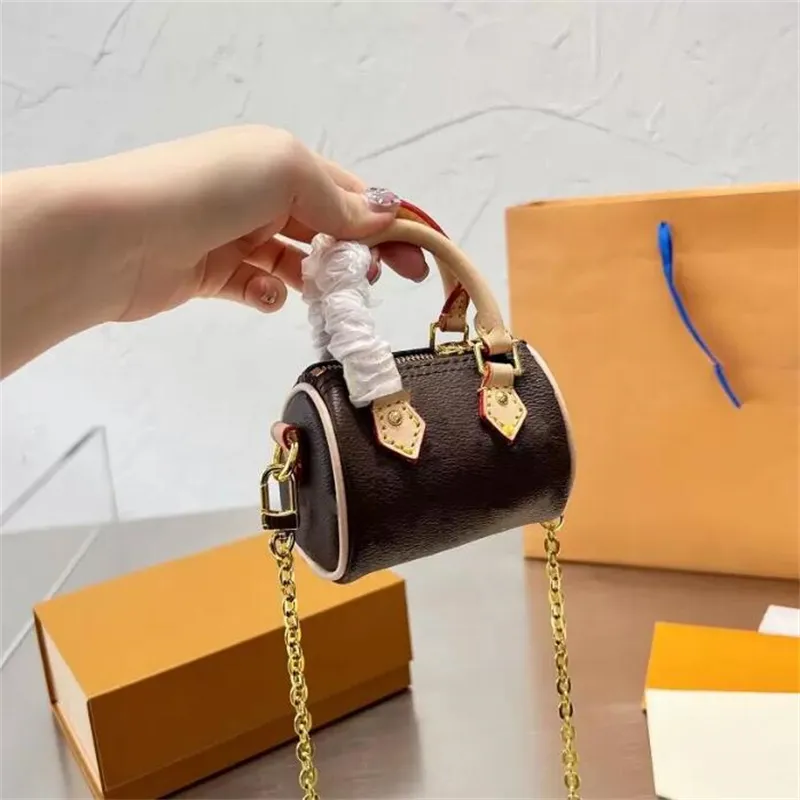 2023 Portefeuilles Mini sac à main Petit sac Sacs de poignet Article de mode Unisexe Femme Homme Accessoires Luxurysbag Designer Produit Rétro Attrayant