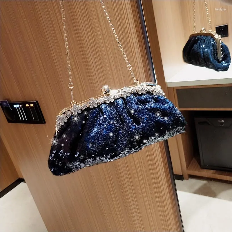 Navy sequin clutch deals