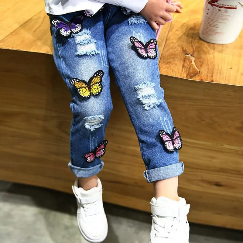 Jeans grossist (5 st / the) -2023 våren barnkläder flickor fjäril barn kläder byxor totalt längd