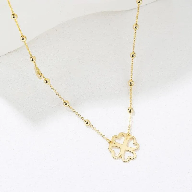 Chaînes à la mode exquis colliers creux quatre feuilles fleur pendentifs chaîne tour de cou bijoux pour femmes bijoux cadeaux