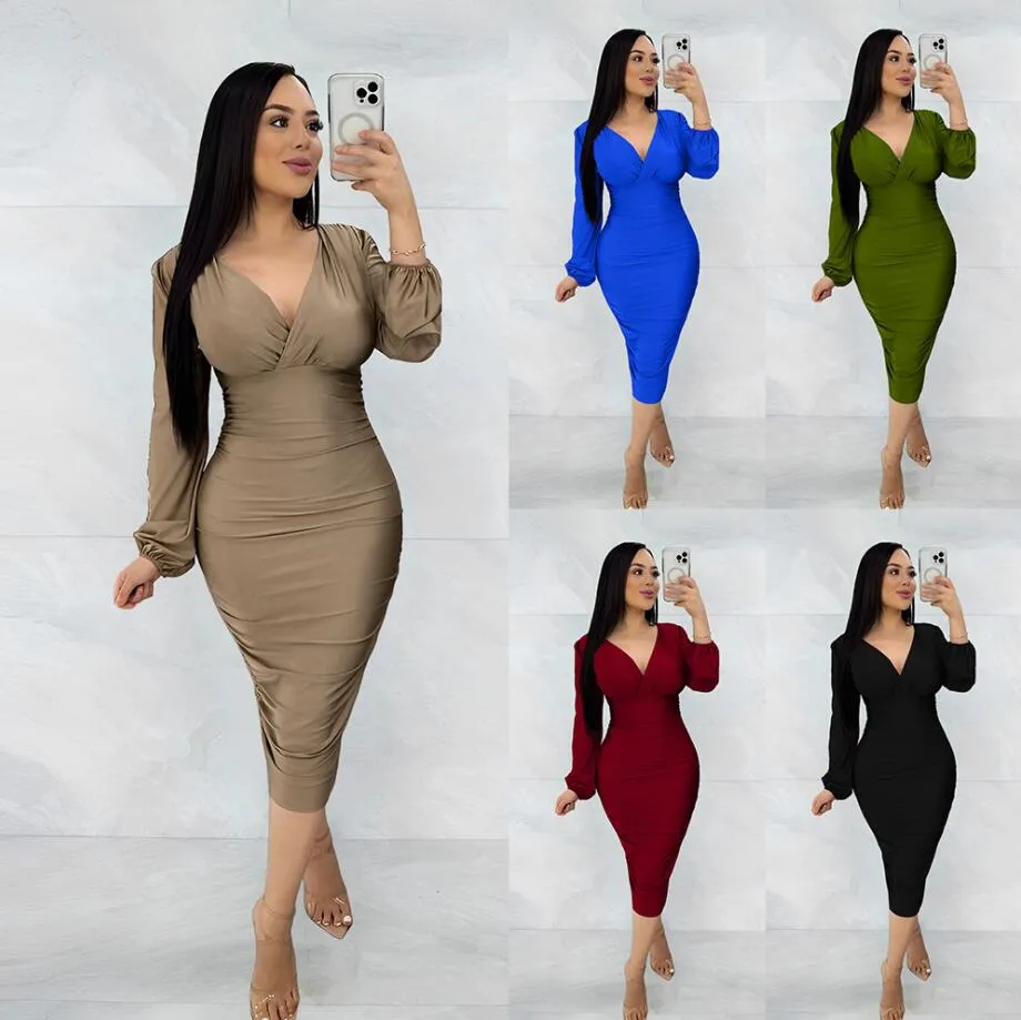 Robes sexy urbaines Femmes européennes et américaines Fashion Street Designer Femmes Vneck Plissée Fesse Jupe Printemps Été Lady Robe Multi Couleur