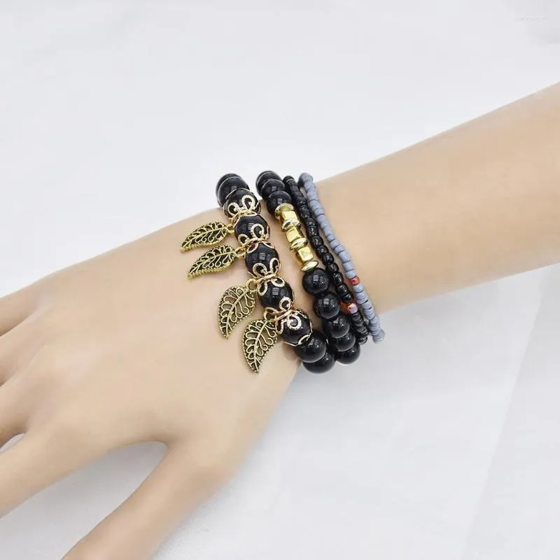 Bedelarmbanden Boheemse etnische stijl vierlaags bladlegering hanger dame rijst kralen armband handgemaakte rek all-match trendjewelry