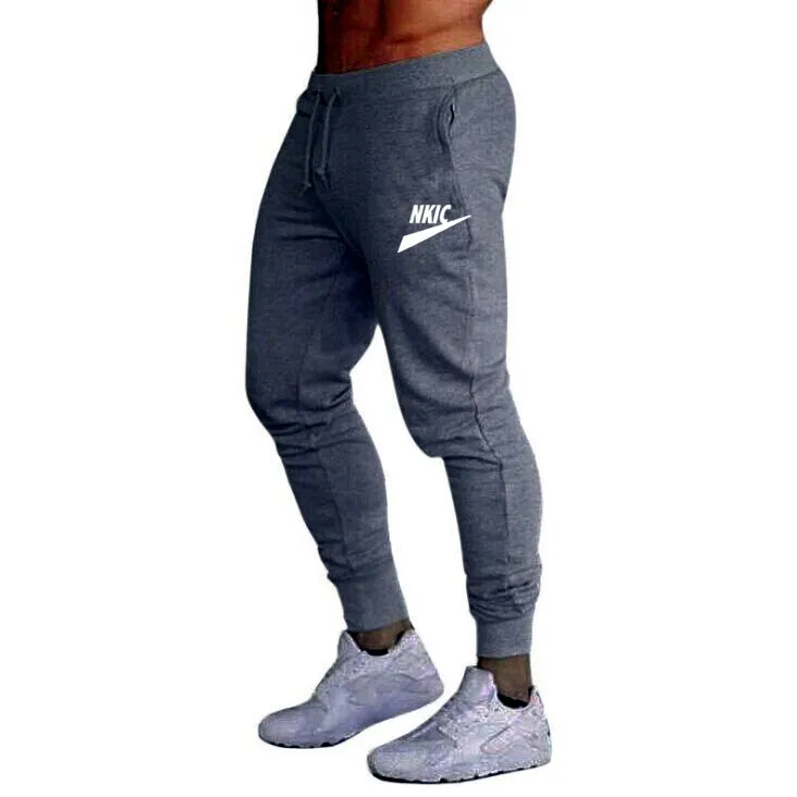 Automne hiver hommes pantalons Jogging course mâle Sport Fitness Sportswear respirant pantalons décontractés marque LOGO imprimer