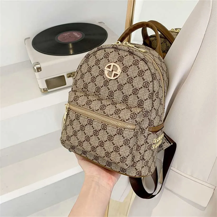 2023 Purses Clearance Outlet Online Sale Autumn and Winter New Fashion ryggs￤ck Stor kapacitet mjuk l￤der resem￤rke kvinnors bokp￥se