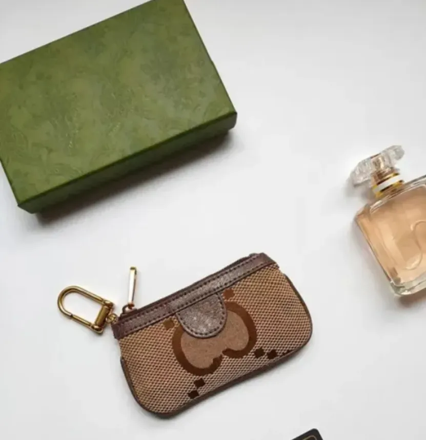 7A Kalite Para Çantası Anahtar Cüzdan Pochette Küçük Koruma Tasarımcısı Moda Ruj Çantaları Kadınlar Erkek Anahtar Ring Kredi Kartı Tutucu Lüks Mini Cüzdanlar Çanta Charm 7 Renk