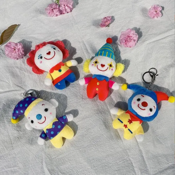 Plush Doll Pendant لطيف سلسلة مفاتيح شخصية المهرج Cartoon Circus Plush Pendant Schoolbag Grab Doll Doll