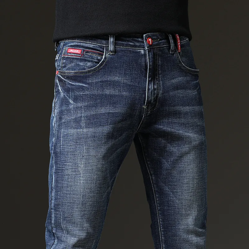 Män s jeans vår höst blå fast färg mikro elastiska klassiska män rak smala mode denim byxor man 230207