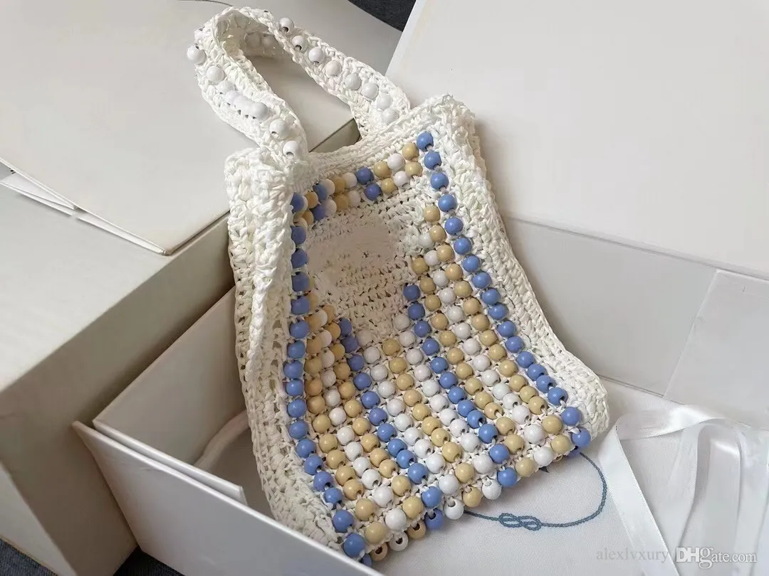 Designer feminino Totes Bolsa de praia Projeto de tecido com bolas de madeira coloridas fibra de coco e lida com as bolsas casuais da mulher embreagem