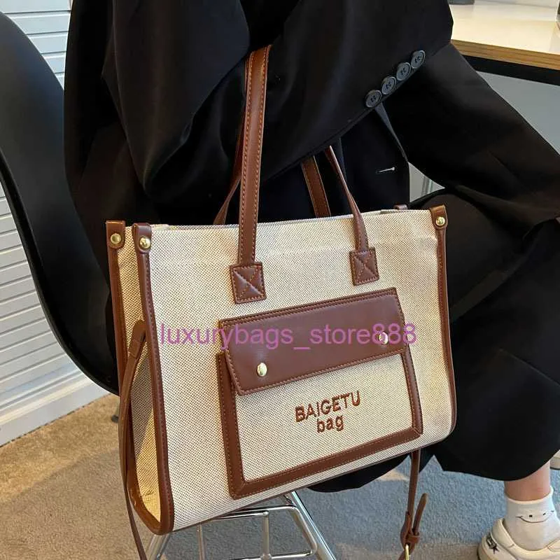 Sac à main en magasin 95% de réduction sur le dédouanement en gros sac en cuir portable de haute qualité pour les femmes 2023 nouveau style Wtern-style polyvalent une épaule Msenger coton et chanvre fourre-tout