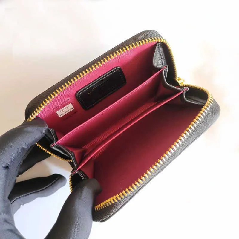 Designer coin purse sale hotsell