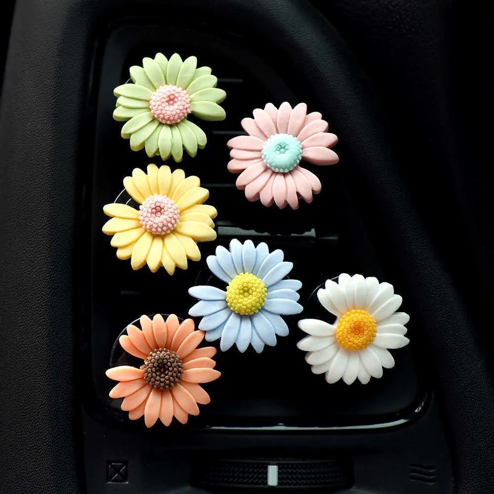 Décorations 12 PCs Petite Marguerite Voiture Clips Sortie Vent Parfum Clip Conditionnement Aromathérapie Décor Auto Intérieur Désodorisant 0209